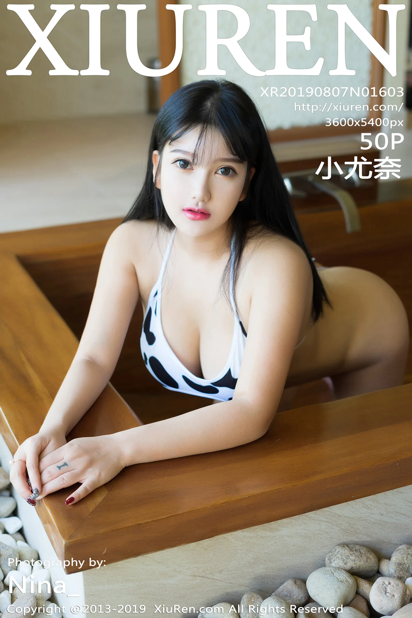 [XiuRen秀人网]No.1603_嫩模小尤奈富国岛旅拍私房奶牛内衣半脱露傲人豪乳极致诱惑写真50P-秀人网 - XiuRen.Pro